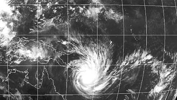 The huge cyclone approaches the Australian coast from the Coral Sea.