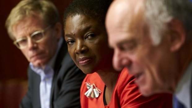 U.N. humanitarian chief Valerie Amos (C) and World Health Organization (WHO) Assistant Director General Bruce Aylward (L) listen to Dr. David Nabarro, senior U.N. coordinator for Ebola, speak during a news conference on Ebola at the United Nations. 