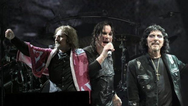 Black Sabbath live, Geezer Butler (left), Ozzy Osbourne, and Tommy Iommi