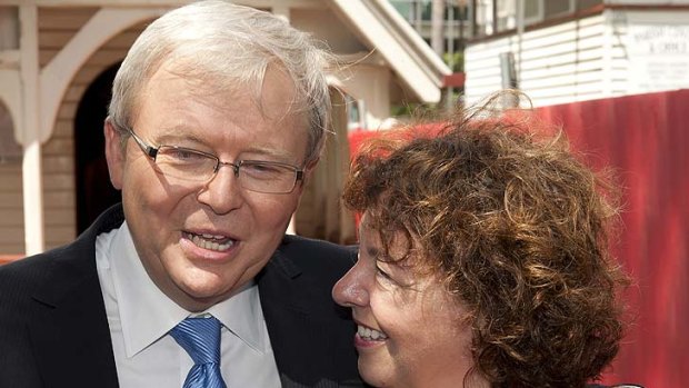 Kevin Rudd speaks to the media with his wife Therese Rein  outside of the Saint John the Babtist church in Bulimba on February 26, 2012.