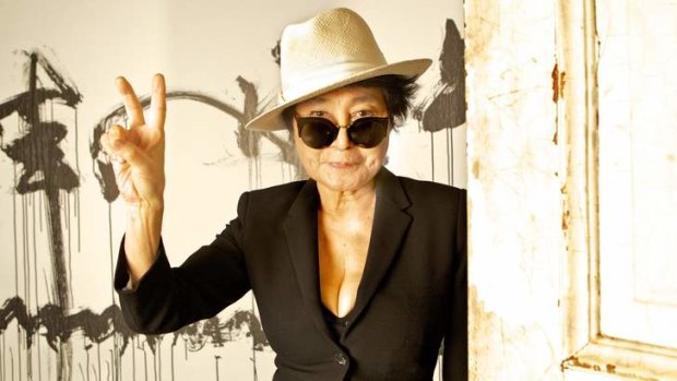 Give peace a chance: Artist Yoko Ono gives the peace sign at the Museum of Contemporary Art, which is holding a retrospective of her work.