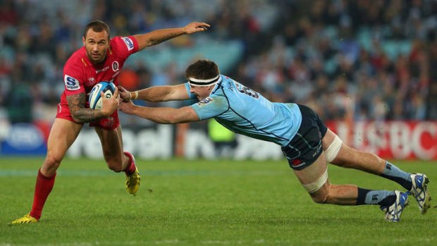 Breaking free: Reds five-eighth Quade Cooper makes a break during last Saturday's win over the Waratahs at ANZ Stadium.