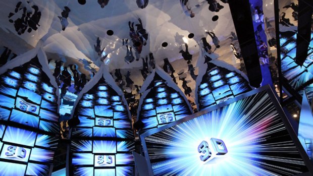 A display of Samsung 3-D televisons in a room with a mirrored ceiling at the 2010 International Consumer Electronics Show.