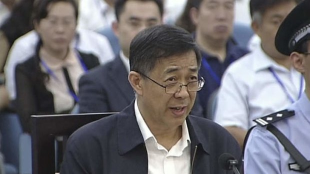 Former Chinese politician Bo Xilai speaks in a court room at Jinan Intermediate People's Court in Jinan.