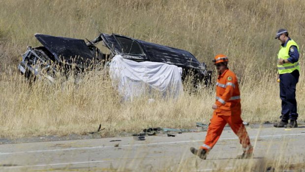 Emergency workers at the scene of the accident near Holbrook on Boxing Day.