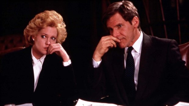 Melanie Griffith and Harrison Ford in the 1988 ode to the power suit, 