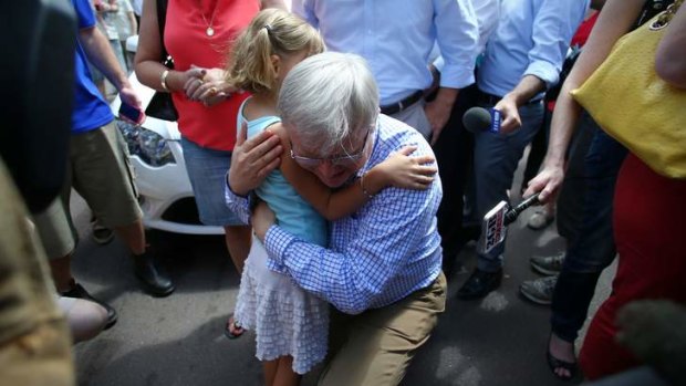 Prime Minister Kevin Rudd hugs Virginia Rudd at Parap markets in Darwin.