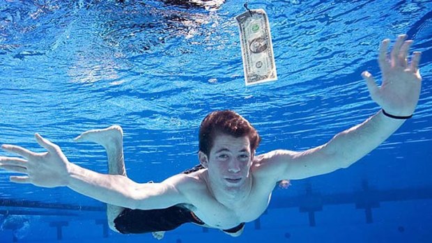 Now an adult, Spencer Eldon strikes a familiar pose recreating the album cover for Nirvana's Nevermind album. For much of America's grunge generation, a comfortable retirement now looks out of reach.