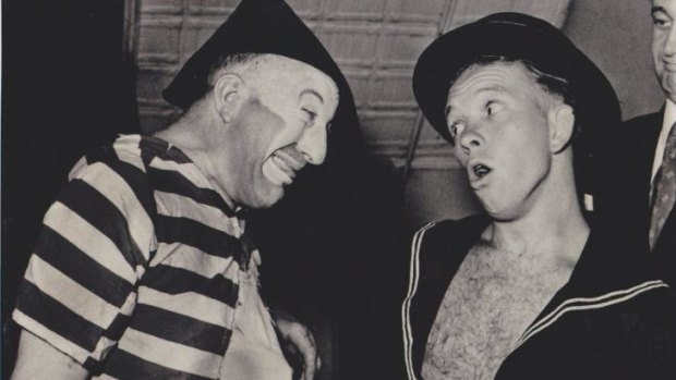 Live: Roy Rene as Mo McCackie and Harry Griffiths as Young Harry. Because the radio show was performed before an audience, the actors appeared in costume.