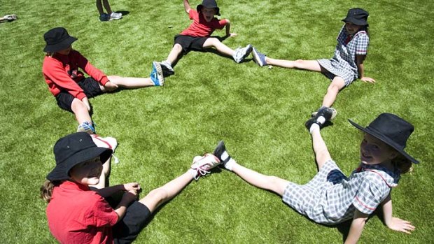 Points for PE: Torrens Primary School students in their playground. A study shows physical activity affects literacy and numeracy.