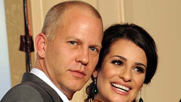 Ryan Murphy and Lea Michele with the Golden Globe award for Best Television Series.