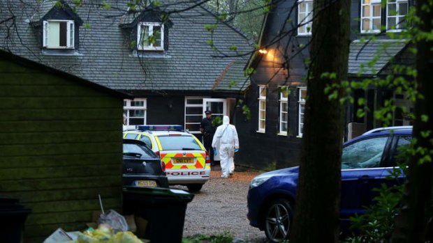Police officers attend the home of Peaches Geldof. Authorities are waiting on a toxicology report that may take weeks.