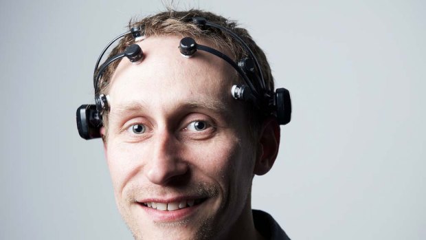 Kevin Brown of IBM Software Group's Emerging Technologies, wearing a headset that can read brain waves.