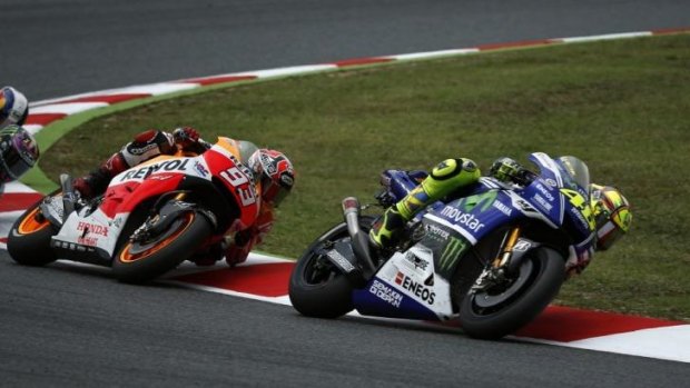 Valentino Rossi leads Marc Marquez during the Catalunya MotoGP on Sunday.