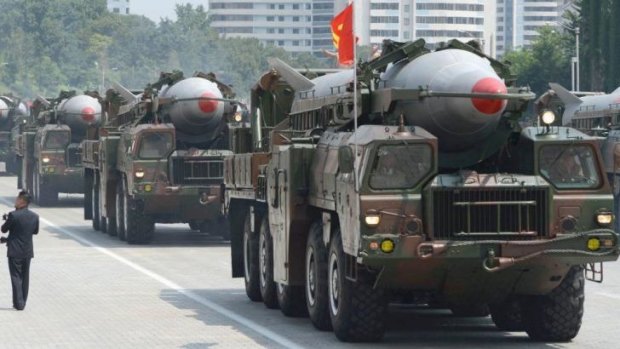 Show of strength: Military trucks carry Rodong missiles during a military parade through Kim Il-sung Square in Pyongyang last July.