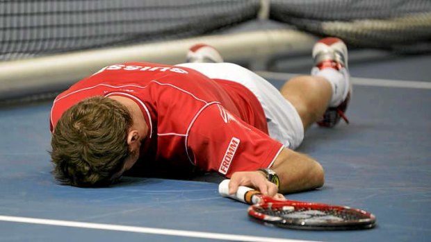 Exhausted ... Swiss player Stanislas Wawrinka.