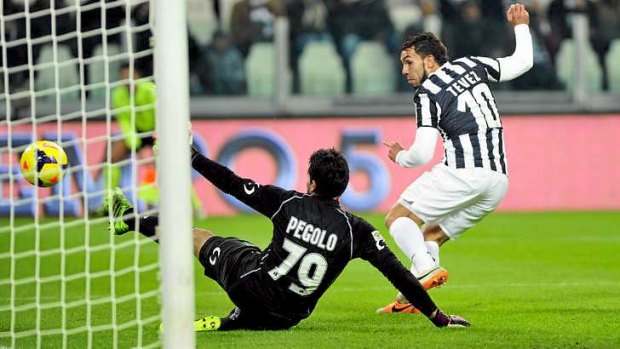 Carlos Tevez powered Juventus to victory.