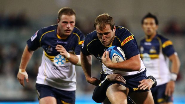Ben Alexander of the Brumbies runs the ball during the round eight Super Rugby match between the Brumbies and the Rebels at Canberra Stadium on April 14, 2012 in Canberra, Australia.  (Photo by Mark Nolan/Getty Images)