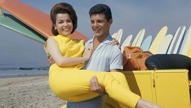 Singer Frankie Avalon and actress Annette Funicello on Malibu Beach in 1963 during the filming of Beauty Party.