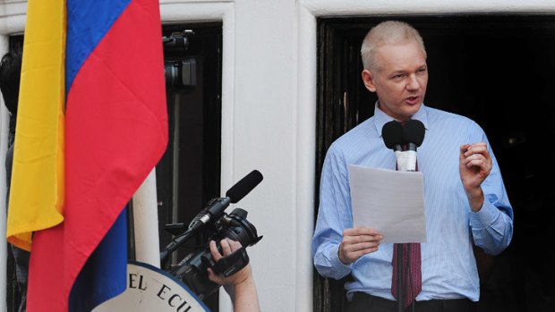 Julian Assange speaks at the Ecuadorean embassy in London earlier this year.