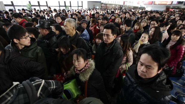 Homecoming ... passengers at Beijing's west railway station make the journey home for Chinese New Year.
