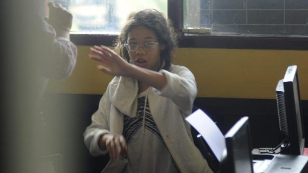 Heather Mack in custody at a police station in Denpasar.