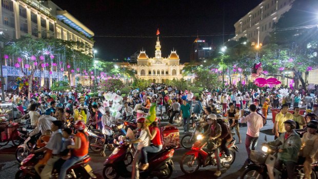 People gather in Ho Chi Minh City celebrating Tet, the Vietnamese New Year.