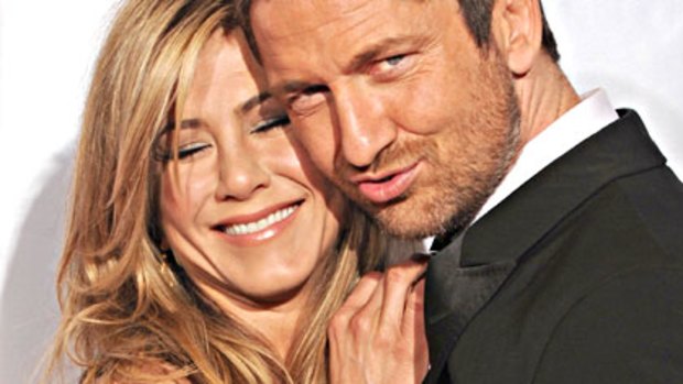 Tight squeeze ... The Bounty Hunter co-stars Jennifer Aniston and Gerard Butler.