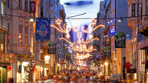 An evening view along the shopping thoroughfare of Istiklal Caddesi in the Beyoglu district of the city. 
