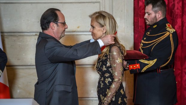 Francois Hollande awards the Legion d'Honneur   to US Ambassador to France, Jane D Hartley on January 16 at the Elysee Palace.