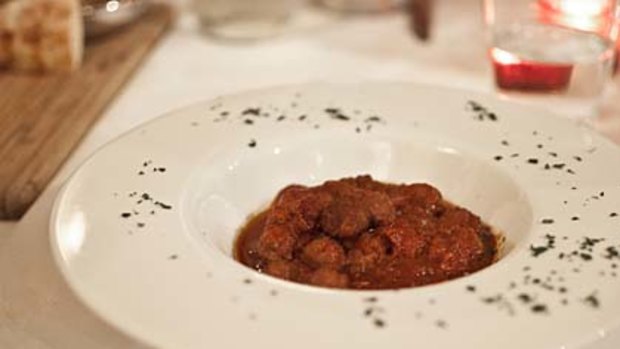 Visneli kofte ... a marvel of soft, marble-sized lamb meatballs cooked in a sour cherry and tomato stew.
