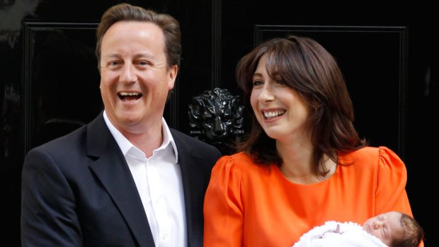 You're hired ... British Prime Minister David Cameron and wife Samantha, pictured with baby daughter Florence in 2010.