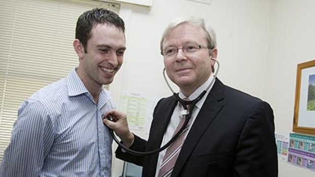 Hearing aid ... Dr David Lockart with Kevin Rudd at  Hornsby General Practice Unit.