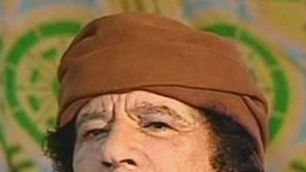 Muammar Gaddafi ... did not attend son's funeral.