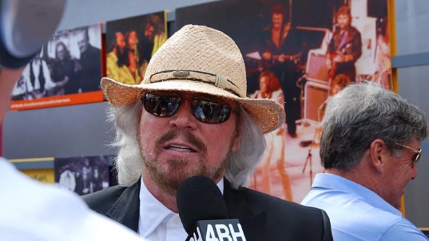 Barry Gibb speaks to media at the ceremony.