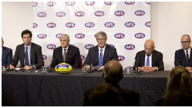 AFL chief executive Gillon McLachlan with (left to right) Kerry Stokes, AFL chairman Mike Fitzpatrick, and Rupert Murdoch as they announce the record-breaking deal.