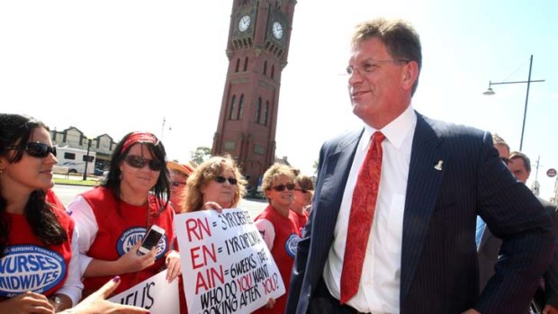 More than 2000 Victorian nurses walked off the job yesterday. Nurses, seen here confronting Premier Ted Baillieu in December, are involved in a long-running industrial feud with the government.