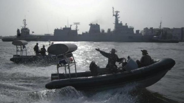 Pakistan Navy personnel guard the PNS Zulfiqar after it returned to Karachi on June 23, 2011. Al-Qaeda militants took over Pakistani frigate PNS Zulfiqar but were killed before they could attack nearby US warships.