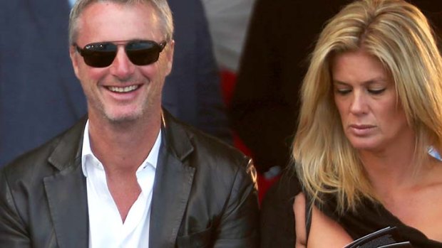 Suspended sentence: Eddie Irvine, pictured with Rachel Hunter at a charity fashion event in Monaco last year.