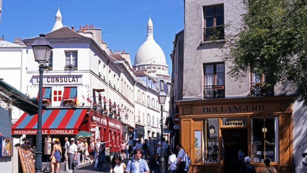 The hip Montmartre district in Paris, where the Refuge des Fondus bar is located.