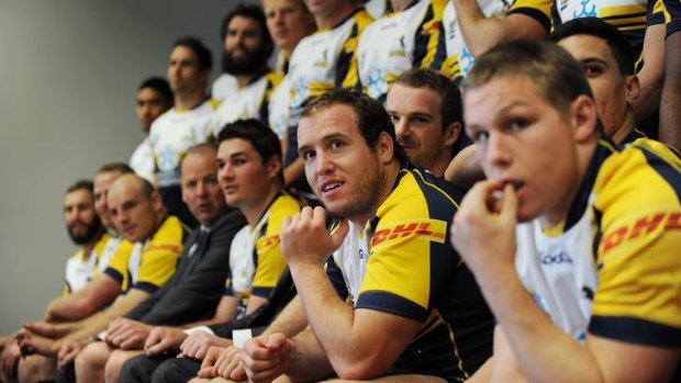 The Brumbies line up for a team photo yesterday.