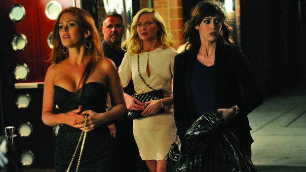 Isla Fisher, Kirsten Dunst and Lizzy Caplan head out on the town.