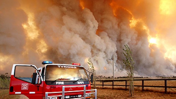 The Country Fire Authority monitors a giant fire raging in the Bunyip State Forest.