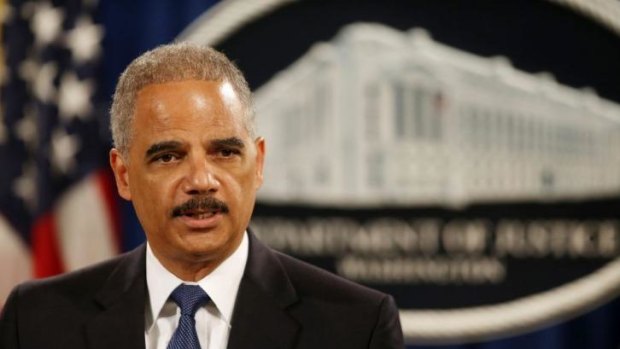 US Attorney-General Eric Holder announces a grand jury has charged five Chinese hackers.