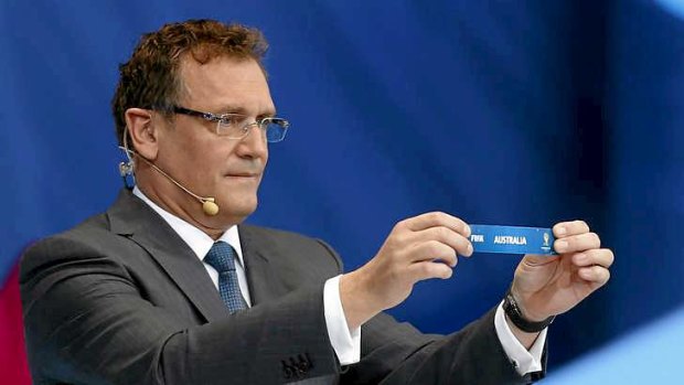 Destiny: FIFA Secretary General Jerome Valcke holds the ticket of Australia during the 2014 FIFA World Cup draw ceremony.