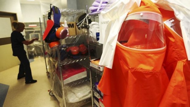 Tracey-Lee Osling, Nurse Unit Manager of Westmead Hospital’s Intensive Care Unit, prepares protective equipment for the Ultra Isolation Rooms, designed specifically to manage patients with highly infectious diseases. 