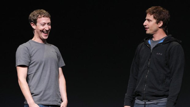 Facebook CEO Mark Zuckerberg, left, jokes with comedian Andy Samberg.