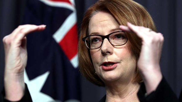Unpopular: Julia Gillard has been criticised by a chancellor of a leading university for cost cutting in the high education sector in order to help fund the schools plan.