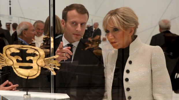 French President Emmanuel Macron and his wife Brigitte Macron visit the Louvre Abu Dhabi Museum on Wednesday.