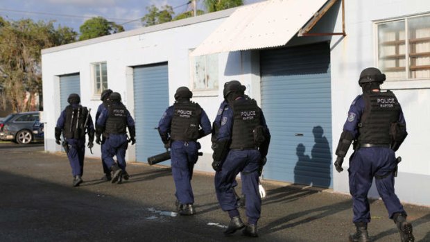 Police raid a Tweed Heads factory as part of a bikie crackdown on the Queensland-NSW border.